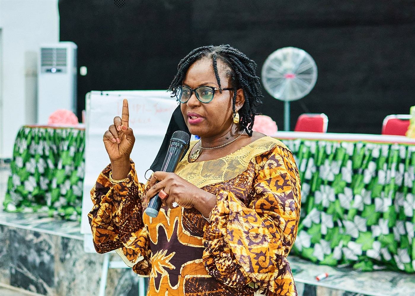 A facilitator speaking at the Women Interstate Peacebuilding Initiative training